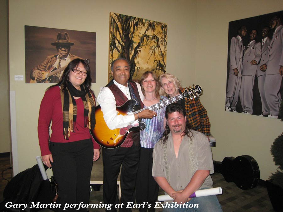 Gary Martin performing at Earl's exhibition